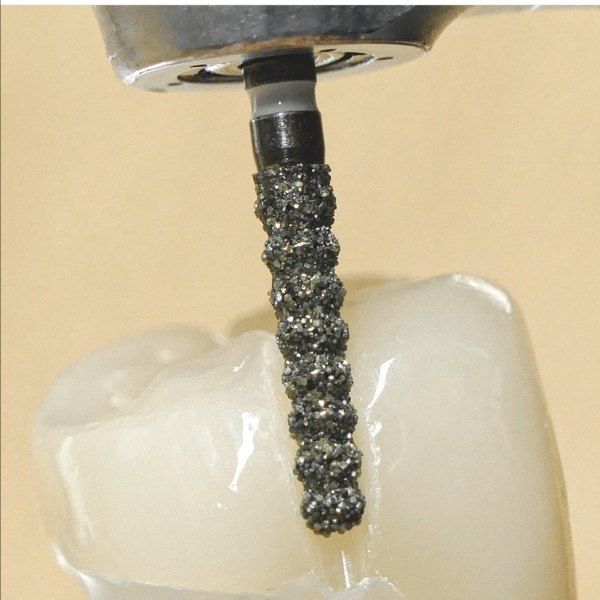 herramienta de dentista con diente